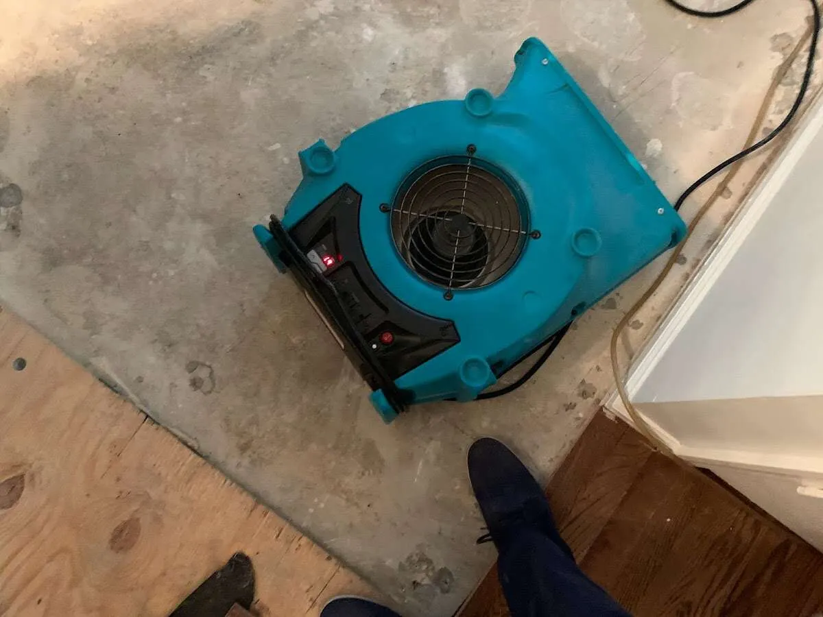 Air mover drying subfloor during Leak Detection & Repair in Bethlehem